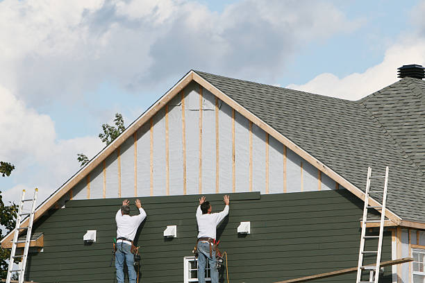 Professional Siding Contractor technician working in Thomasville, PA